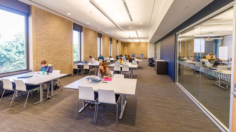 Located in the northwest corner, just off the North Reading Room, the Collaboration Hub is equipped with large and small tables, study nooks, group study rooms, videoconference rooms, and comfortable lounge chairs. The space is surrounded by large windows and natural light, with mobile monitors and whiteboards available throughout.