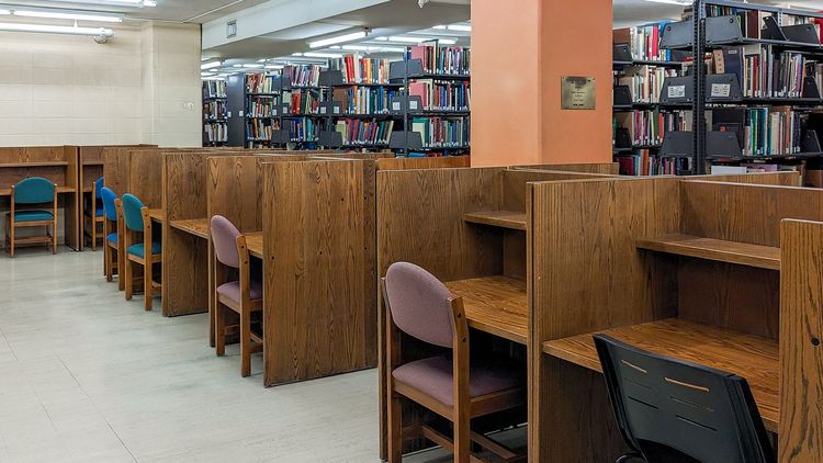 Seating includes tables and individual study cubbies located throughout this unrenovated tower floor. You will find a handful of window seats with spectacular campus views. If you’re looking for a quiet place to study, the tower floors are an excellent option.